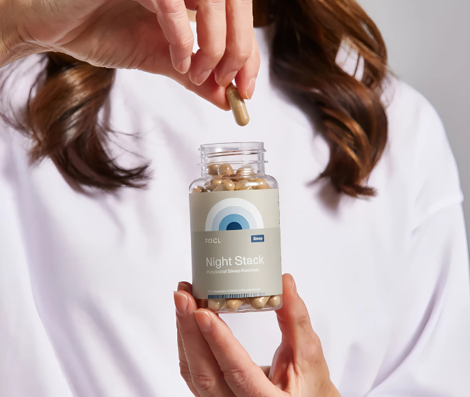 FOCL Night Stack supplements in bottle - Promotes restful sleep with plant-based ingredients.