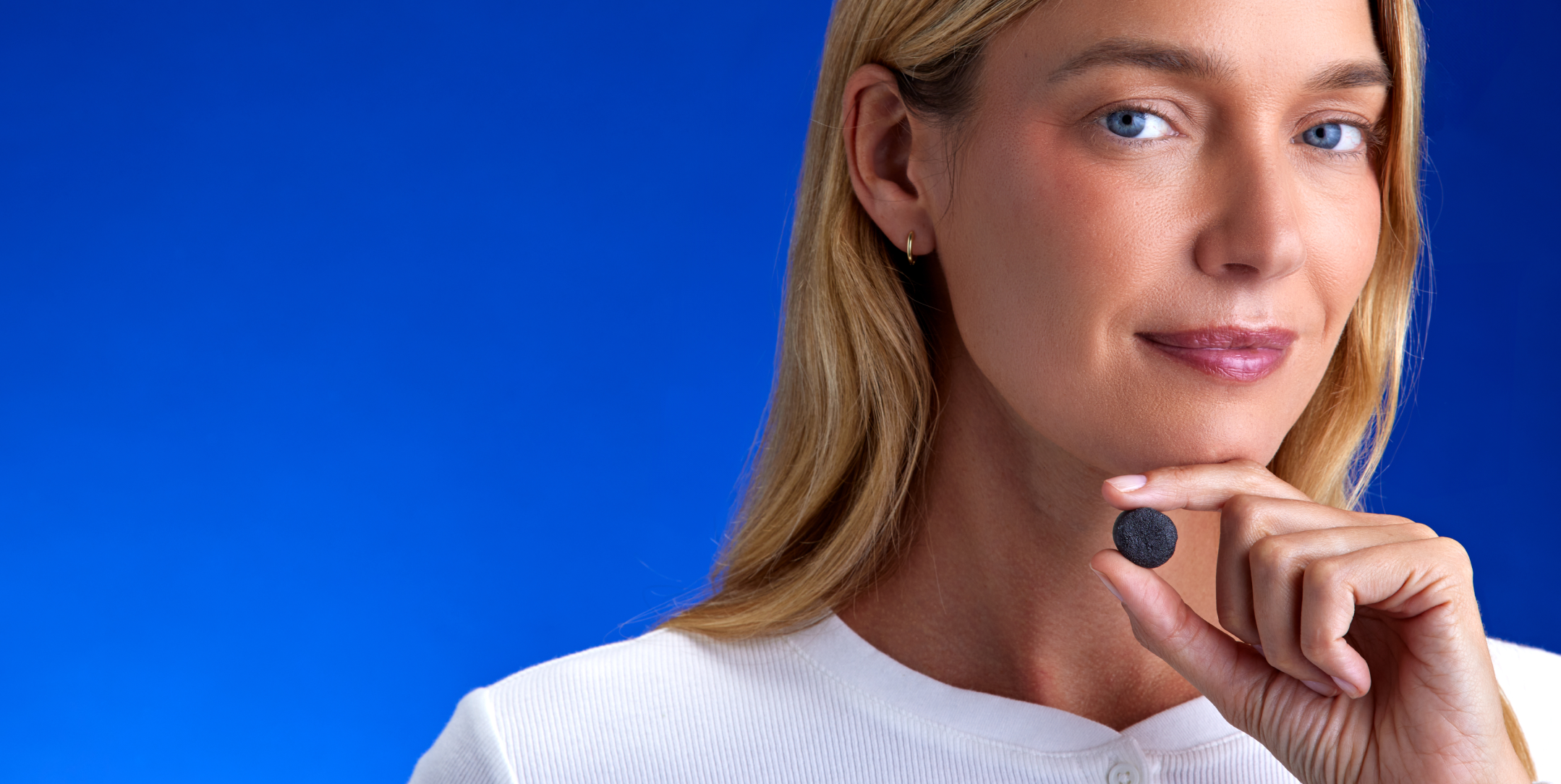 FOCL promo - Close-up of a serene face - Promoting calm and focus with plant-based wellness supplements.