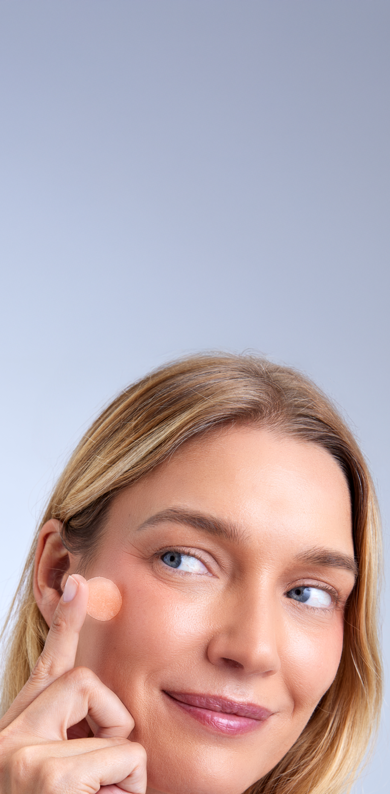 Subscribe to FOCL's premium wellness supplements - Happy woman with radiant skin - Achieve balance and clarity.