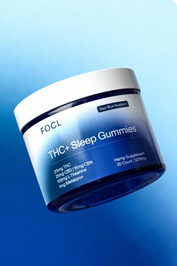 Jar of THC+ Sleep Gummies withFOCL branding on a blue background