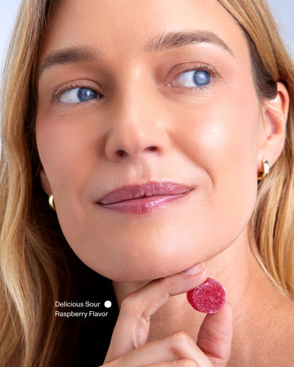 FOCL Chill supplement - Woman smiling confidently - Promotes calm and relaxation.