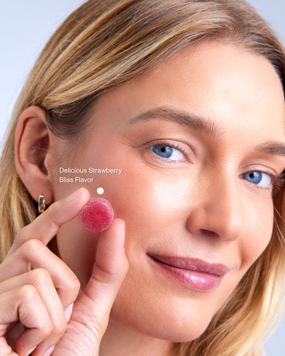 FOCL wellness supplement being applied to lips, promoting calm and focus through plant-based ingredients.