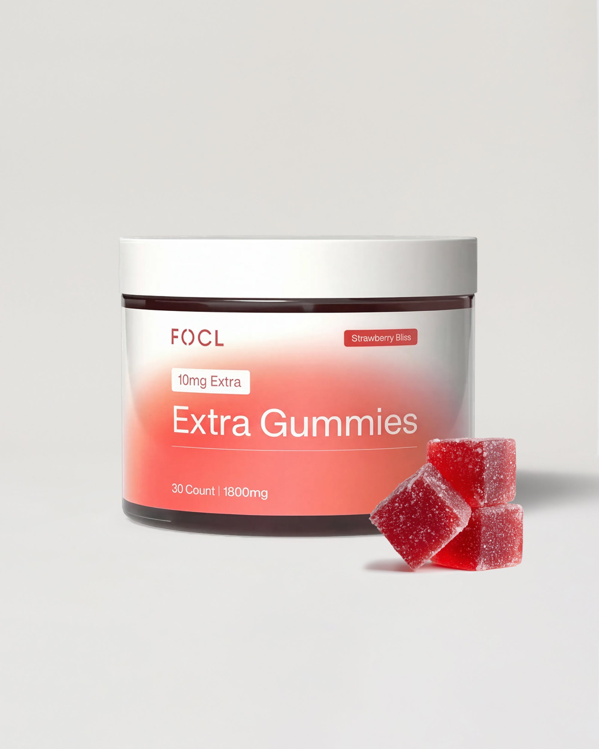FOCL Extra Gummies container with two gummies on a light gray background