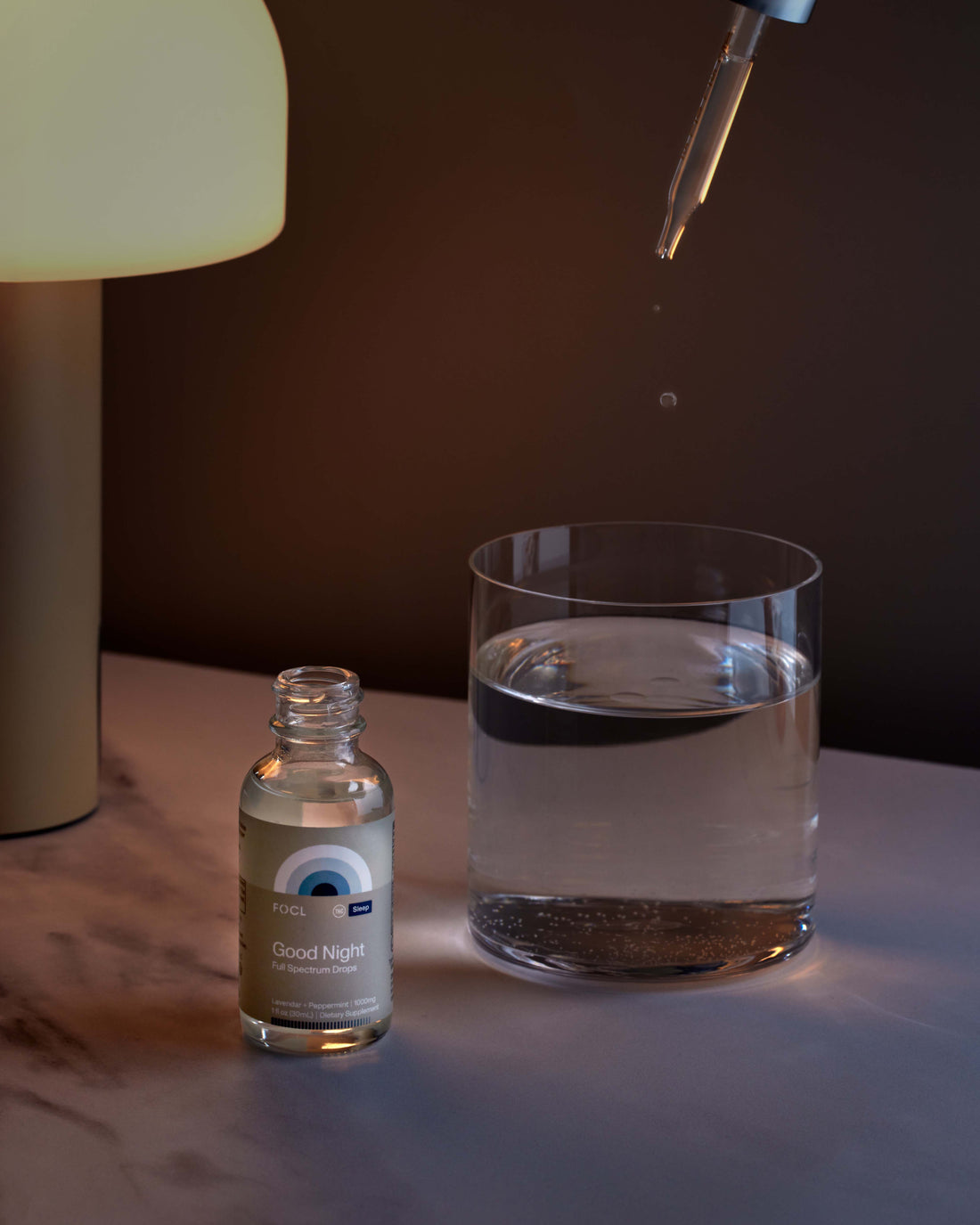 FOCL GoodNight Drops in a glass dropper bottle - promotes restful sleep and calm with plant-based ingredients.